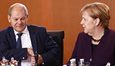 Olaf Scholz and Merkel